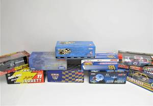 Lot of 9 Mint in Box Diecast Race Cars