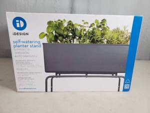 lot 15 image: New Self Watering Plant Stand