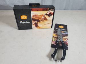 lot 35 image: New Oklahoma Joes Bone Cutter Meat Shears and Injector