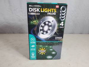 lot 43 image: New Bell and Howell Disk Lights Deluxe
