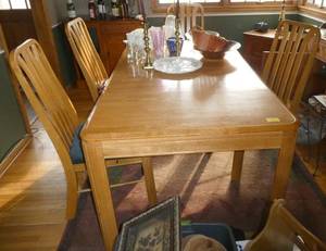 lot 10 image: Nice Dining table with 4 chairs.  Table is 65x38 with one leaf in it (11-12) A few scratches from normal use but overall in very good condition