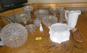 lot 36 image: Group of pressed glass pieces including a very unique acrylic sphere candy dish with big dimples in it and an elephant planter and milk glass pitcher