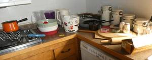 lot 38 image: All kitchen items on the counter - includes floursugar containers, pizza stone and more