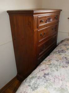 lot 39 image: Matching Bedroom Set - 5 drawer dresser (38x17x50) Headboard 66 wide 52 tall and 7 drawer dresser (67x18x32) with mirror (43x45)