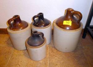 lot 50 image: 4 very good condition pottery whiskey jugs