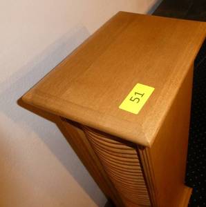 lot 51 image: You are going to need a lot of CDs and DVDs to fill this double sided swivel holder.  41 tall 11x7-12