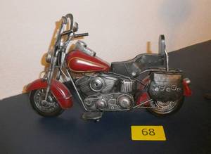 lot 68 image: A very neat tin Motorcycle, 13 long