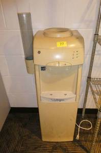 lot 77 image: culligan water unit, used with the big 5 gallon bottles