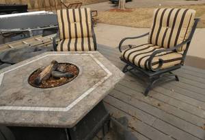 lot 114 image: Heavy duty steel frame patio set 4 chairs wcushions and with propane center fire pit - all chairs have cushions