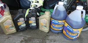 lot 121 image: 2 gallons washer fluid 4 quarts 5W-30 motor oil