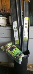 lot 138 image: sticks of landscape edging (about 5 ft each) and stakes
