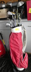 lot 149 image: Mixture of Golf clubs with bag