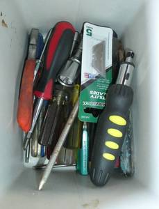 lot 171 image: cooler with a bunch of screwdrivers, nutdrivers, utility blades