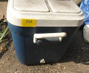 lot 258 image: Gott 48 Quart Cooler with a bunch of jumper cables