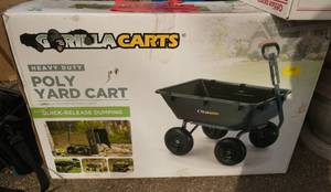 lot 263 image: New in box Gorilla Carts Poly Yard Cart - quick release dumping - 1200 lb 6 cubic ft capacity