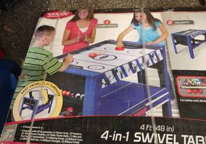 lot 264 image: New in box 4-in-1 Swivel table - table hockeypoolbasketballping pong