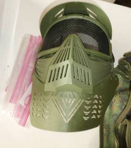 lot 281 image: Nice Airsoft vest with tons of pockets for ammo and Face shield
