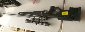 lot 284 image: Airsoft rifle with scope - has the weight of a real gun