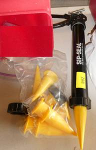 lot 288 image: Commercial caulk gun Sip-Seal with extra tips, looks new