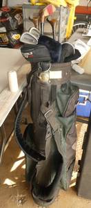 lot 294 image: Golf bag with clubs and covers