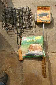 lot 299 image: Camping utensils all new - basket, toaster, cast iron cooker