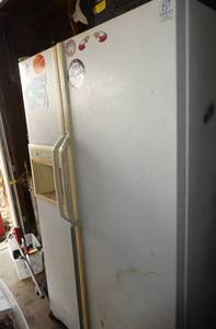 lot 349 image: 2 door refrigerator for the garage, needs cleaning but works good, still running