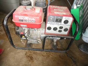 lot 208 image: Honda EG3500 Generator - has been sitting for 7-8 yrs so the gas smells and the carb would need to be cleaned etc