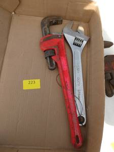 lot 223 image: Large pipe wrench and adjustable wrench