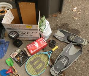 lot 332 image: Misc lot with a 10 lb barbell, grass seed, disposable gloves, snorkeling fins, racketball racket, pet nail clipper, lock