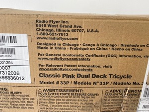 lot 61 image: RADIO FLYER CLASSIC PINK DUAL DECK TRICYCLE