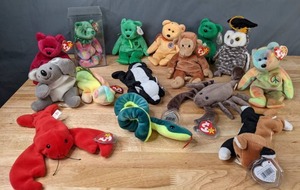 lot 98 image: Collection of (15) TY Beanie Babies Hissy the Snake, Wise the Owl, Stinky the Skunk, Erin the Good Luck Bear, & More - B