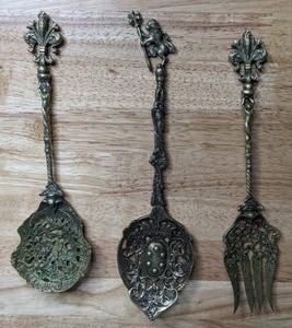 lot 144 image: Antique Italian Serving Spoons and Fork (Montagnani) - B
