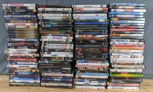 lot 134 image: Large Collection of DVDs Zombieland, The Hunger Games, Lord of the Rings, Cheaper by the Dozen, Mr. Woodcock, Runaway Jury, & More - B