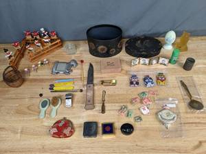 lot 238 image: Collection of Miscellaneous VintageAntique Items Doorknocker, Planters Mr. Peanut Spoon, Stamps, Coin Purses, Tin Litho Animal Clicker Toys, and Much More  - B