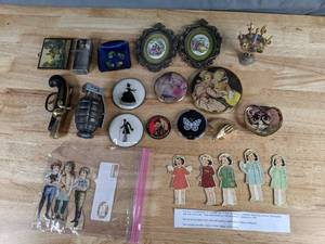 lot 240 image: Collection of Cool Vintage Items Flintlock and Hand Grenade Lighters, Sword Cocktail Picks, Dionne Quintuplets Ornaments, Compact Double Mirrors, and Much More - B