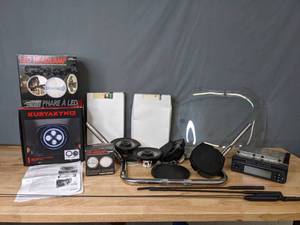 lot 352 image: Motorcycle Headlight, Windshield, Stereo Helmet Headset, Harley Davidson Radios, Speakers and More Accessories - Q