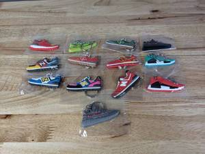 lot 33 image: Collection of 13 Brand New Adidas and New Balance Shoe Sneaker Keychains Kanye West Yeezy HMD 574 - T