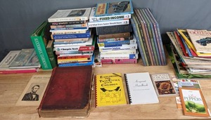 lot 392 image: Large Book & Periodicals Collection The Beanie Baby Handbook, Weird Minnesota, Natural Geographics, Famous Old Cars, & More - V