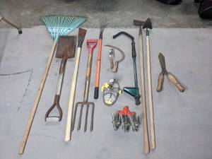 lot 408 image: Lawn Care Items Rakes, Shovel, Tiller Attachment, Hedge Shears, Sprinkler, and More - V