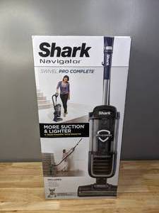 lot 28 image: Brand New Shark NV151 Navigator Pet Upright Swivel Pro Complete Vacuum - T