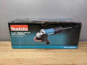 lot 26 image: Brand New Makita 7.5 Amp 4-12 in. Paddle Switch Angle Grinder - T