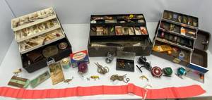 Vintage tackle boxes, wooden lures, vintage tackles, Herters fly rod holder, reels and more.