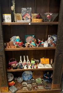 4 shelves full of misc. items ( Wood shelf not included )