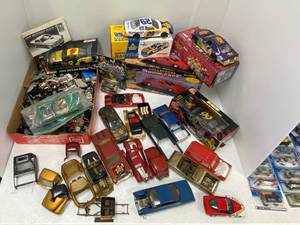 Model car junkyard lot with die-cast cars