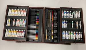 Art studio acrylic paintsColored pencils and pastels