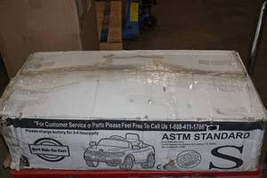 lot 27 image: BMW 4 Series Coupe Remote Control Battery Operated Ride On Toy