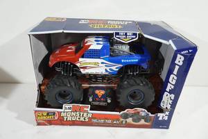 lot 56 image: NEW New Bright Bigfoot 4x4x4 110 Scale Remote Control Monster Truck