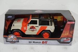lot 161 image: NEW Jada Jurassic World Jeep Wrangler Remote Control Truck