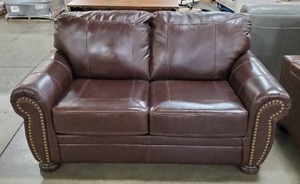 lot 122 image: Ashley Furniture - Banner Loveseat