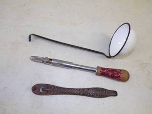 lot 36 image: Antique Push Drill, Laurel Stove Top Handle, Porcelain Ladle